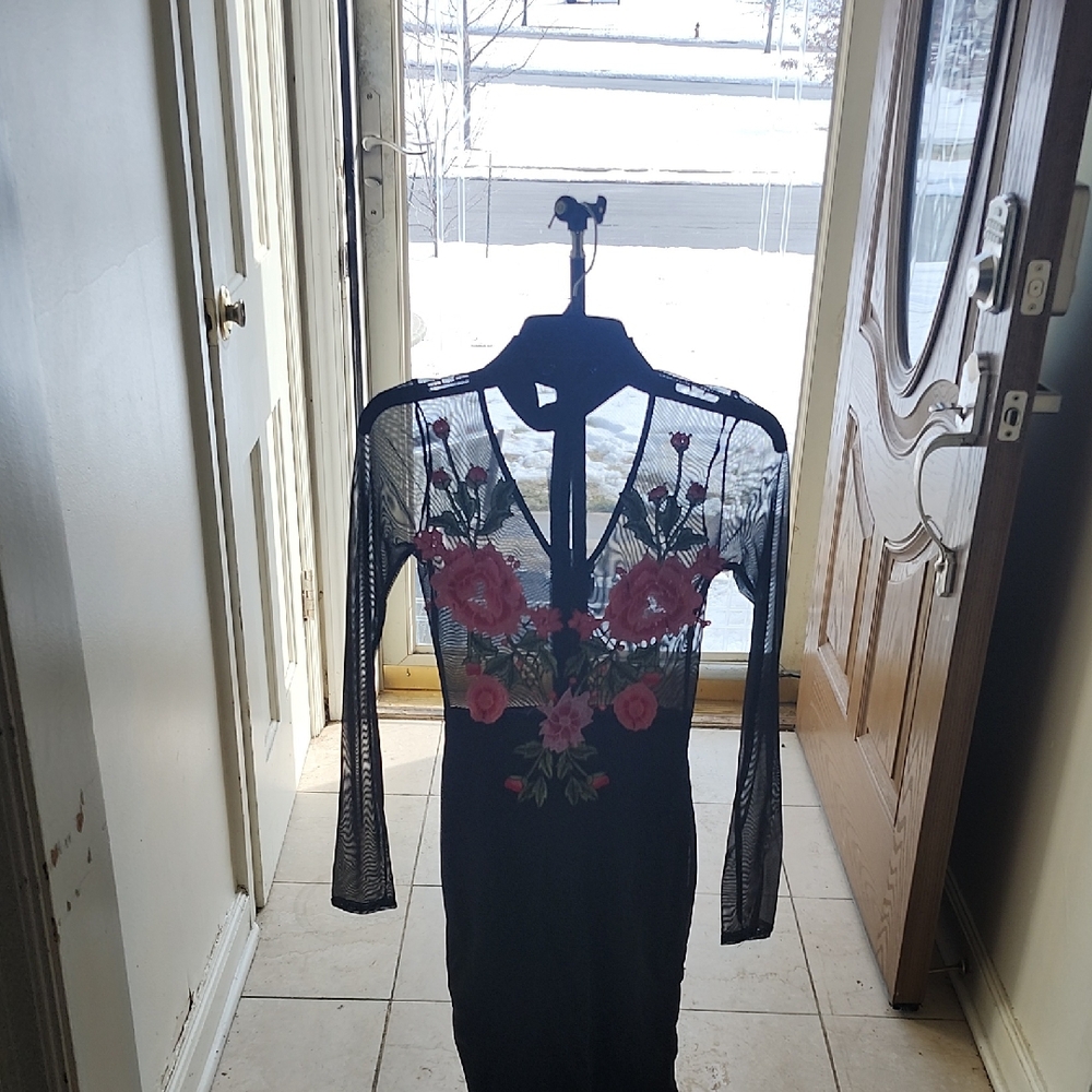Elegant Black Dress with Floral Accents